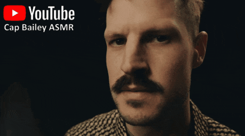 a man with a mustache is featured in a youtube video