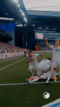 a group of soccer players on a field with one wearing a shirt that says ' varbet ' on the back