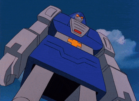 a blue and white robot with an orange cross on the chest