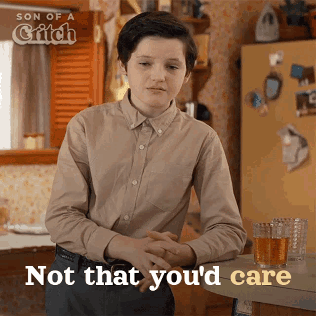 a boy in a brown shirt says not that you 'd care in a kitchen