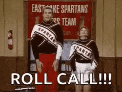 two cheerleaders are standing next to each other in front of a sign that says `` roll call !!! '' .
