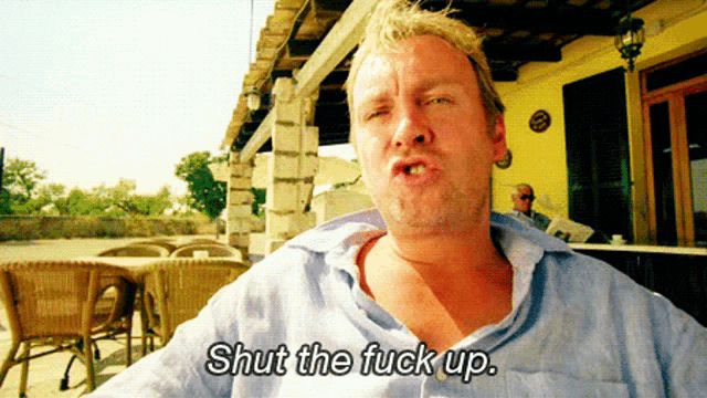 a man says shut the fuck up in front of a restaurant