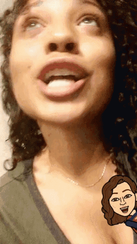 a close up of a woman 's face with a cartoon of a woman 's face behind her