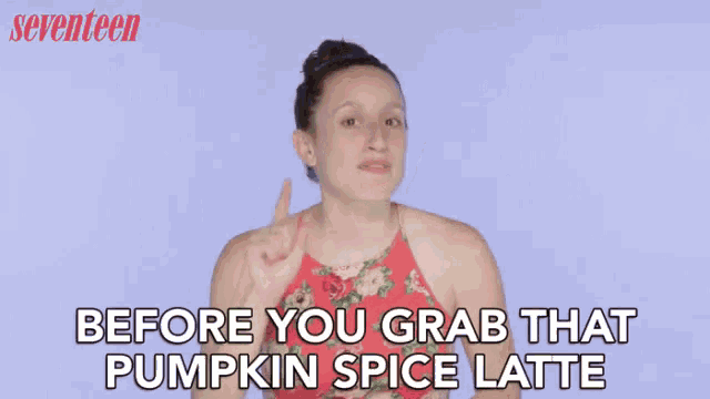 a woman in a red top is talking about pumpkin spice latte