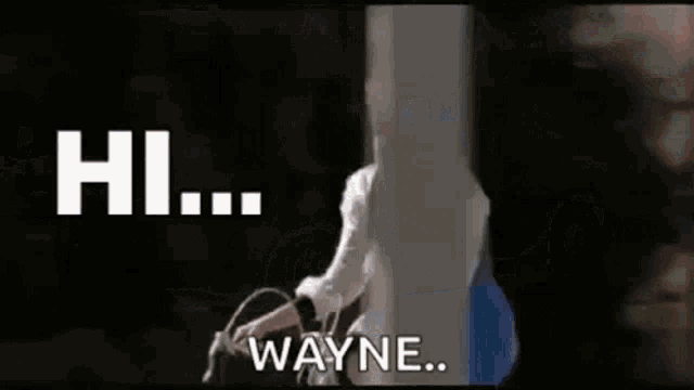a woman is sitting on a chair with a bandaged neck and says `` hi ... wayne '' .
