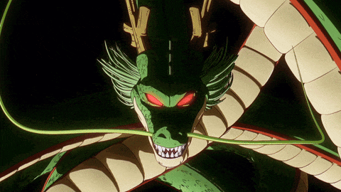 a green and white dragon with red eyes