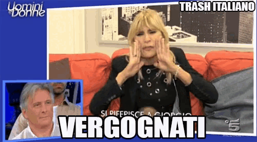 a woman is sitting on a couch with her hands on her face and trash italiano written on the bottom right