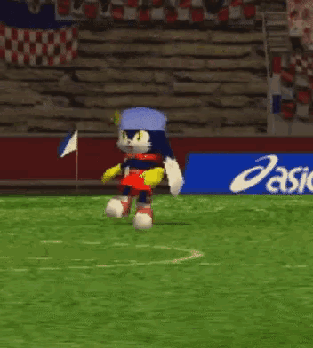 a cartoon character wearing a blue hat and red shorts is dancing