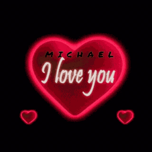 a red heart with the name michael written on it