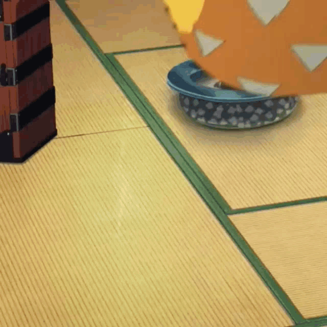 a person is laying on their back on a mat .