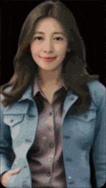 a woman wearing a denim jacket and a purple shirt