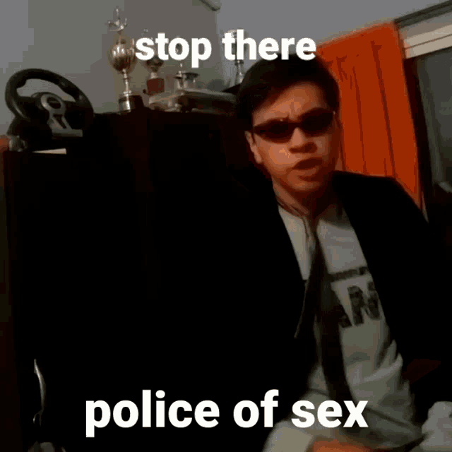 a man wearing sunglasses is pointing at the camera with the words stop there police of sex below him