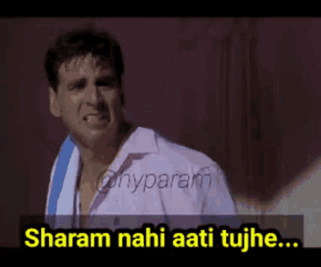 a man with a towel around his neck says sharam nahi aati tujhe