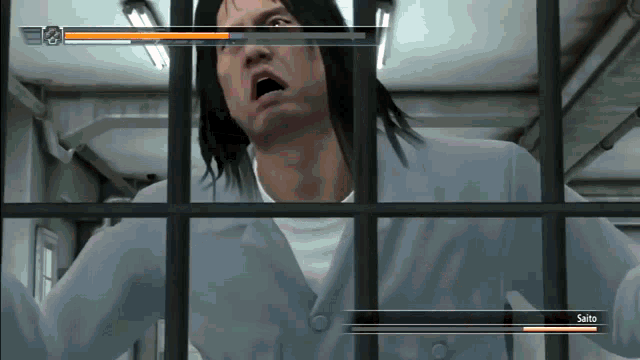 a video game screen shows a man behind bars with the name saito on the screen