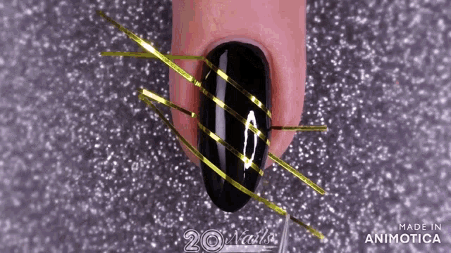 a close up of a nail with the words made in animatica on it
