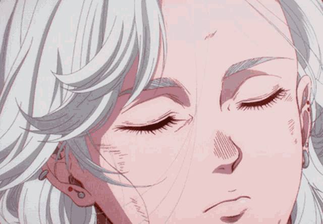 a close up of a woman 's face with red eyes and white hair