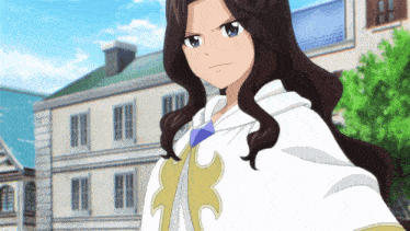 a girl in a white cape stands in front of a building with a green roof