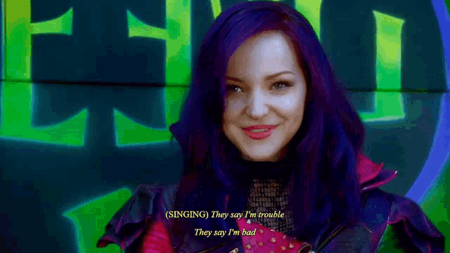 a woman with purple hair is singing they say i 'm trouble