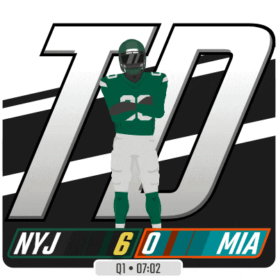 a new york jets football player is standing in front of a large nyj logo