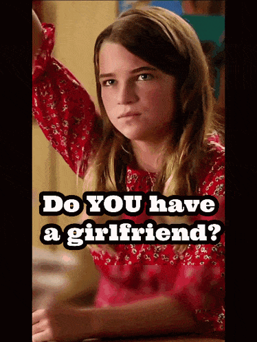 a girl sitting at a table with the words do you have a girlfriend below her