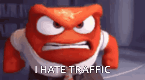 a cartoon character with a very angry face and the words `` i hate traffic '' .