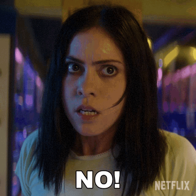 a woman is making a face and says no