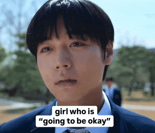 a man in a suit with the words girl who is going to be okay