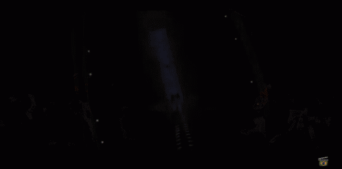 an animated image of a very long building with a light coming out of the top