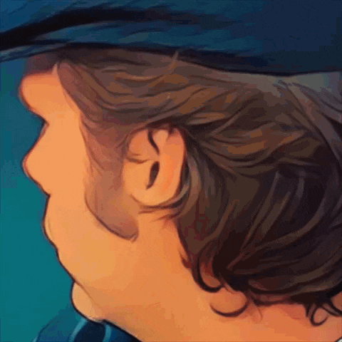 a close up of a man 's ear and hair