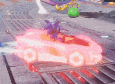 sonic the hedgehog driving a pink car on a track