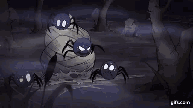 a bunch of spiders are wrapped in a web in a dark forest