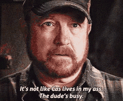 a man with a beard and a hat says it 's not like cas lives in my ass .