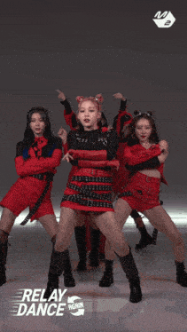 a group of girls are dancing in red outfits with the words relay dance on the bottom