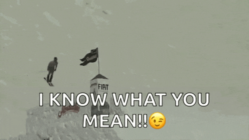a snowboarder is doing a trick in the snow and says i know what you mean !