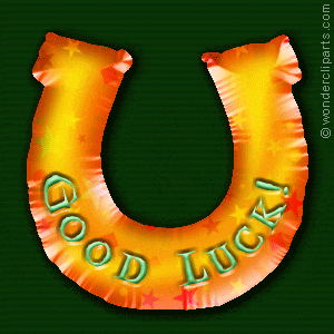 a balloon in the shape of a horseshoe with good luck written on it