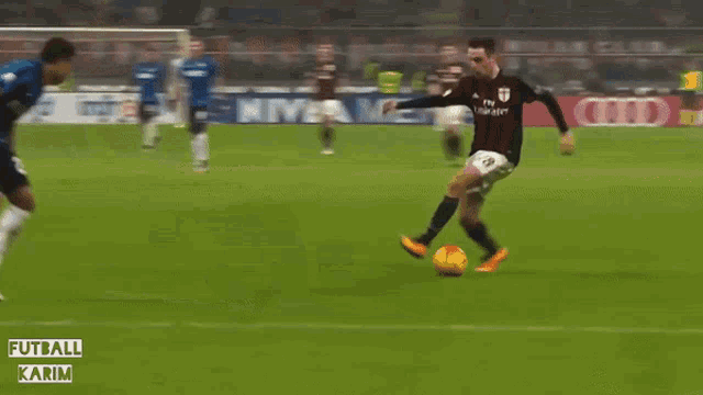 a soccer player with the number 18 on his shorts kicks the ball