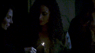 a close up of a fire in the dark