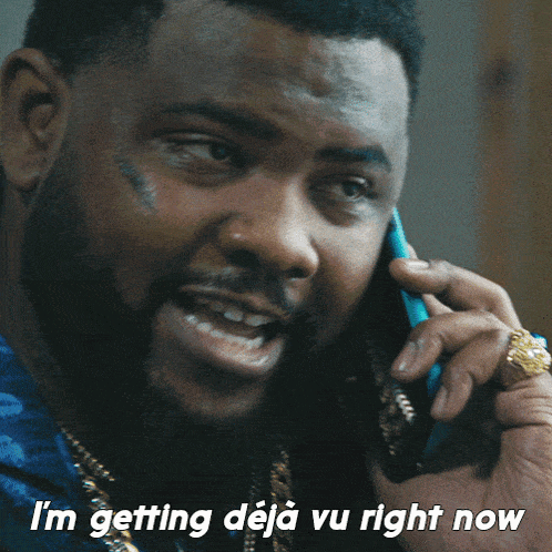 a man talking on a cell phone with the words i 'm getting deja vu right now