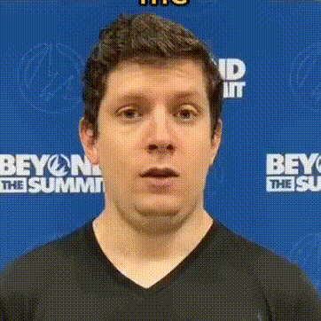 a man wearing a black shirt is standing in front of a blue background that says beyond the summit
