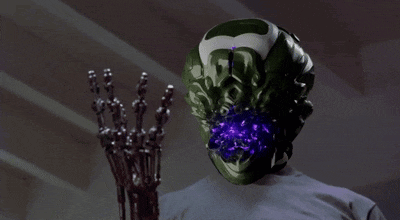 a robot with a purple light coming out of it 's face