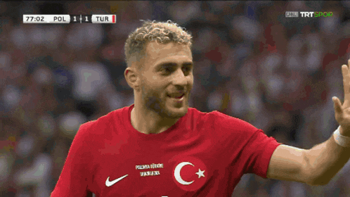 a soccer game between pol and tur is being played