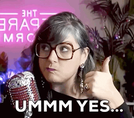 a woman wearing glasses is giving a thumbs up and the words ummm yes are on the bottom