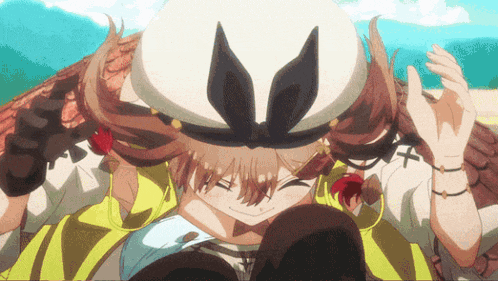 a cartoon character wearing a white hat with ears on it