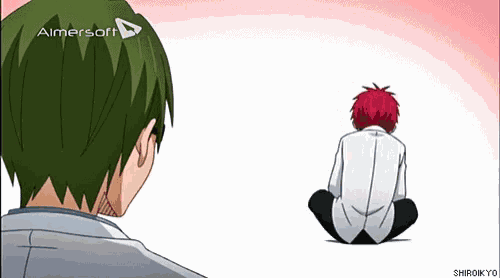 a man with green hair and a red haired boy are sitting next to each other on the floor .