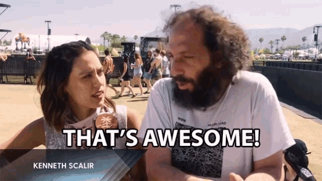 a man with a beard is talking to a woman who says " that 's awesome "