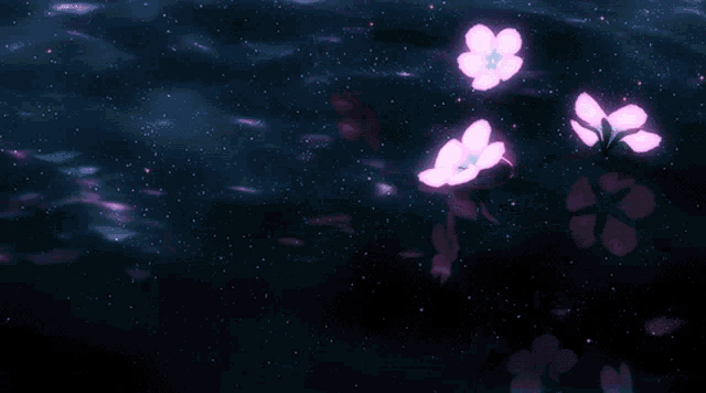 a bunch of pink flowers are floating in the air