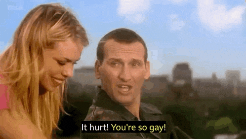 a man and a woman are talking to each other .
