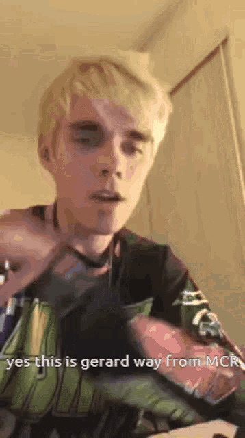 a man in a green shirt says yes this is gerard way from mcr.