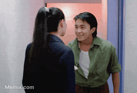 a man and a woman are standing next to each other and the website memix.com is displayed in the corner