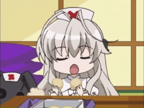 a nurse is sitting at a table with her eyes closed and holding a tray of food .